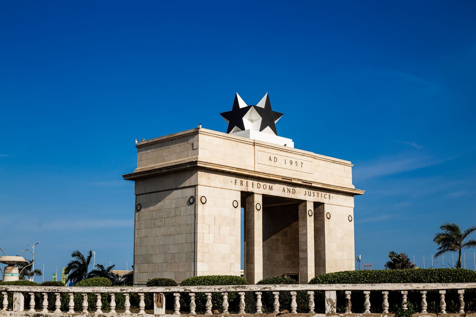 Independence Arch at Independence Square, Accra, Ghana, under a clear blue sky